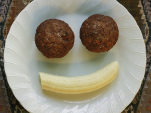marc moritsch smiling breakfast of muffins and a banana