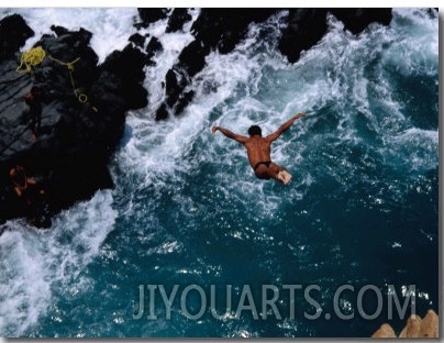 Clavadista (Cliff Diver) Jumping into Canal, Acapulco, Guerrero, Mexico