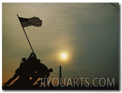 Silhouetted View of the Iwo Jima Memorial with the Capitol and Washington Monument Behind