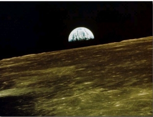 Earth Rise Over Moon Surface