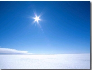 The Sun Appears as a Bright Pointed Star in a Crisp Blue Polar Sky