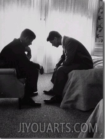 Presidential Candidate John Kennedy Conferring with His Brother and Campaign Organizer Bobby Kenned