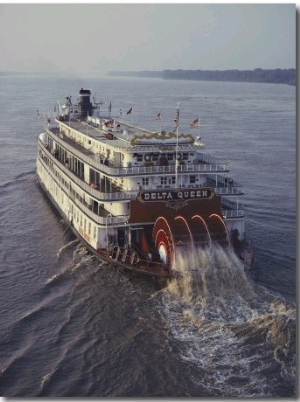 The Delta Queen, a Steamboat, Makes its Way up the Mississippi River