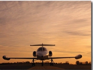 Twilight View of a Lear Jet on the Runway