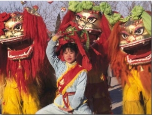 Girl Playing Lion Dance for Chinese New Year, Beijing, China