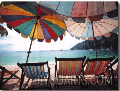 Umbrellas and Chairs on Beach, Thailand