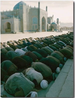 Afghan Men Pray Near the Mosque in Mazar I Sharif