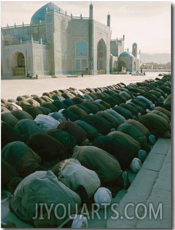 Afghan Men Pray Near the Mosque in Mazar I Sharif