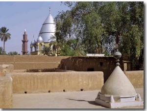 Grave of Al Mahdi Lies Beneath the Large Mausoleum in the Background, His Former Home Is in the For