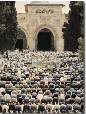 Observing Ramadan, Moslem Men Bow and Pray in Front of a Mosque in Jerusalem