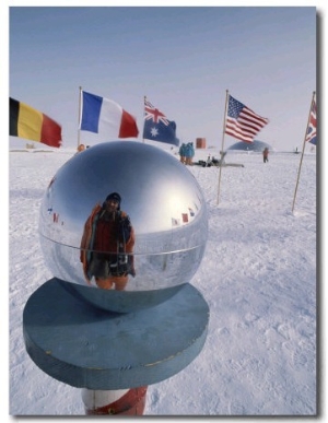Flags of Many Nations and a Ceremonial Globe at the South Pole