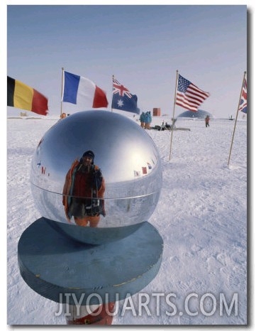 Flags of Many Nations and a Ceremonial Globe at the South Pole