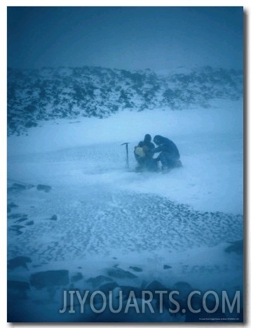 Two People in Blizzard Conditions, Antarctica
