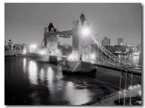 A View of Tower Bridge on the River Thames Illuminated at Night in London, April 1987