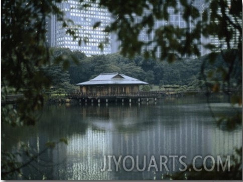 View across a Seawater Pond and a Teahouse in Hamarikyu Gardens
