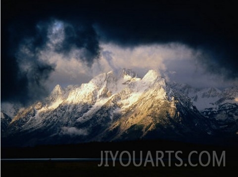 Storm Clouds Over Snow Capped Mountain, Grand Teton National Park, USA