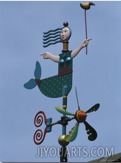 A Colorful Mermaid Shaped Weather Vane