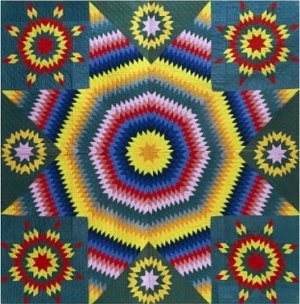 A Mennonite Pieced & Appliqued Cotton Quilted Coverlet, Pennsylvania, Late 19th Century