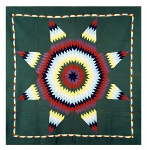 An Amish Star of Bethlehem Coverlet, Pennsylvania, Pieced and Quilted Cotton, Circa 1930
