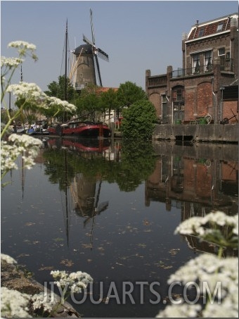 Dutch City Scene with Windmill Reflected in the Water