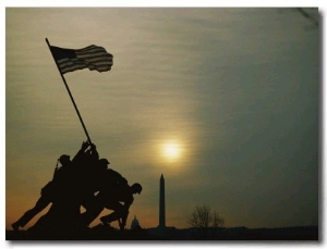 Silhouetted View of the Iwo Jima Memorial with the Capitol and Washington Monument Behind