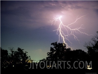 Bolt of Lightning Brightens a Night Sky1