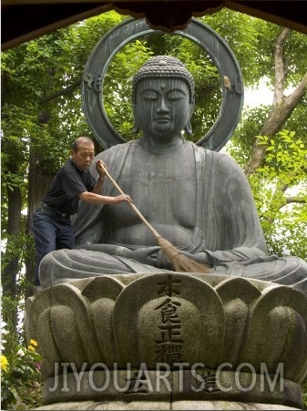Man Cleaning a Buddha Statue, Shinnyo Do Temple, Kyoto, Kinki, Japan