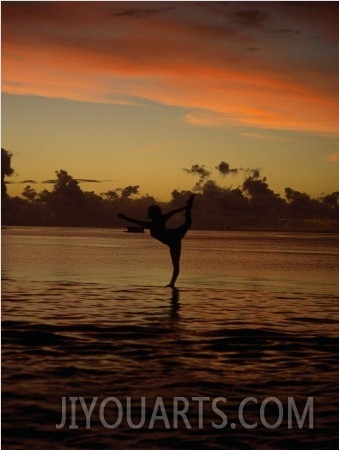 Woman Doing Yoga in Water at Sunset, Tahiti