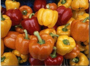 Red, Orange and Yellow Bell Peppers on Display in a Venice Market