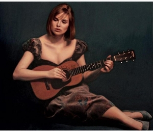 Woman playing guitar