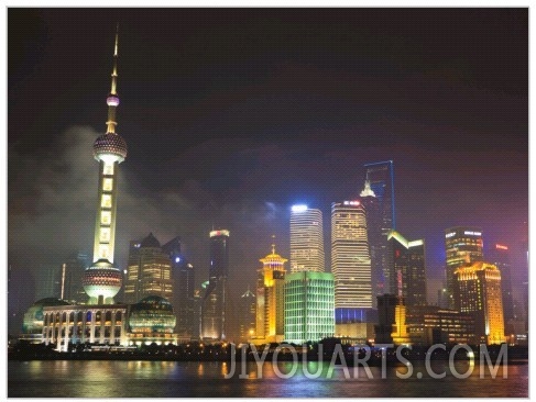Pudong Skyline at Night across the Huangpu River, Oriental Pearl Tower on Left, Shanghai, China,As